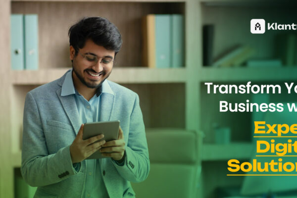A smiling man in a light blue blazer uses a tablet in a modern office with bookshelves in the background. The text reads “Transform Your Business with Expert Digital Solutions” alongside Klantroef branding.