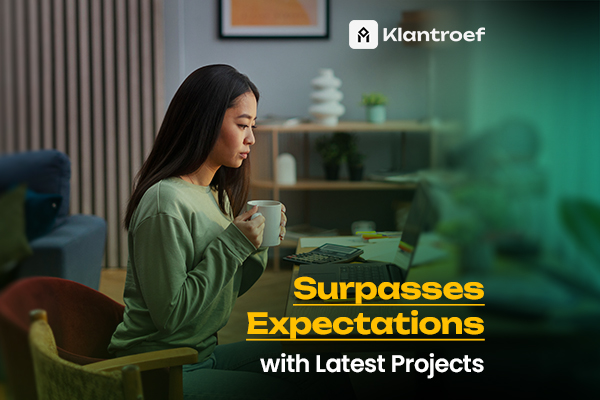 Woman working intently at her desk with coffee, reflecting Klantroef's successful project execution.