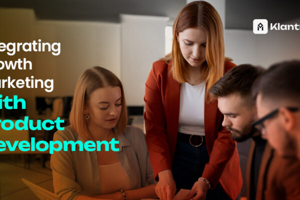 A team discussing plans around a table, led by a woman in a red blazer, symbolizing alignment between product development and growth marketing.