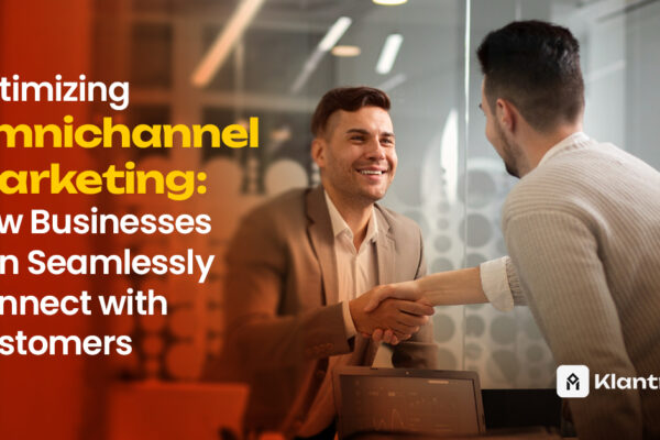 Two professionals shake hands in a modern office setting, symbolizing trust and strong customer connections through omnichannel strategies.