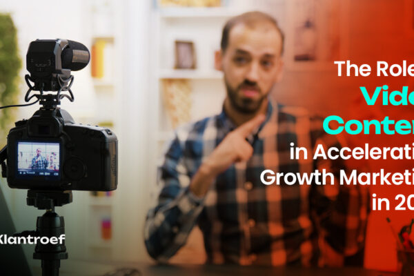 A man recording himself with a DSLR camera, representing the production of video content for digital marketing.