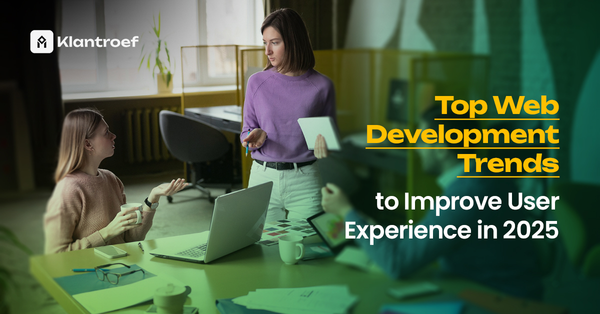 Three professionals are discussing ideas in a modern workspace with laptops and documents on the table. The text reads “Top Web Development Trends to Improve User Experience in 2025” with Klantroef branding.