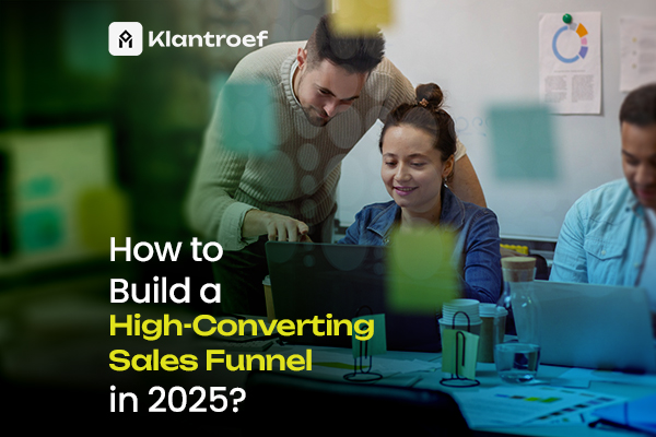 "How to Build a High-Converting Sales Funnel in 2025? – two colleagues collaborating on a laptop in an office, with the Klantroef logo in the top left corner and sticky notes visible in the foreground."